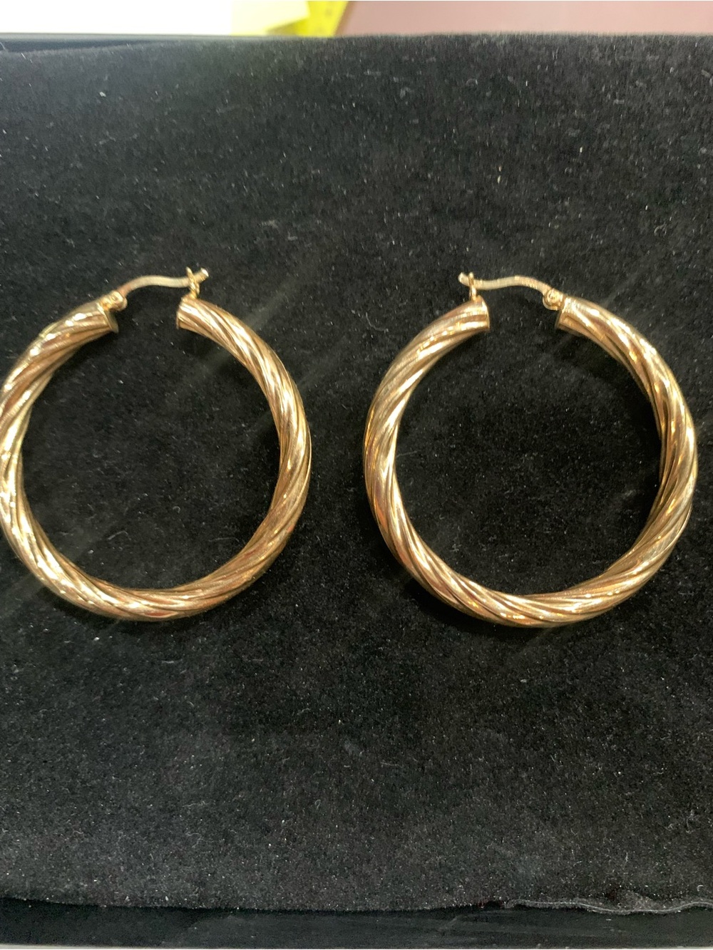 14k Gold Twisted Hoop Earrings - Weight 7.4 grams.